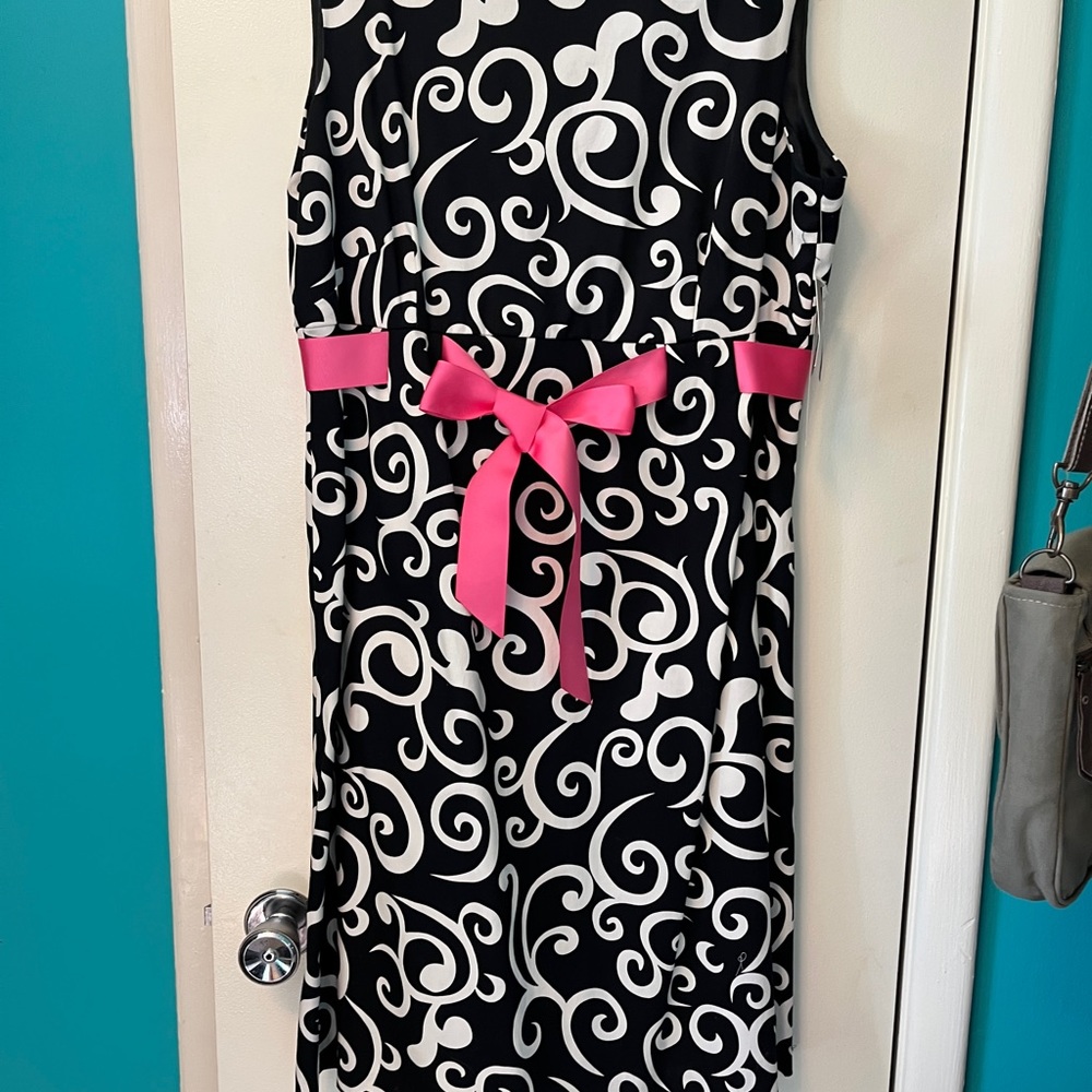 Beautiful black and white sleeveless dress with pink sash